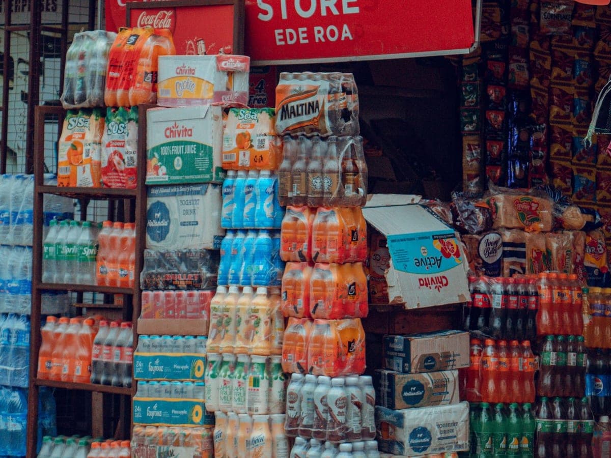 A shop stacked front to back with crates of stock